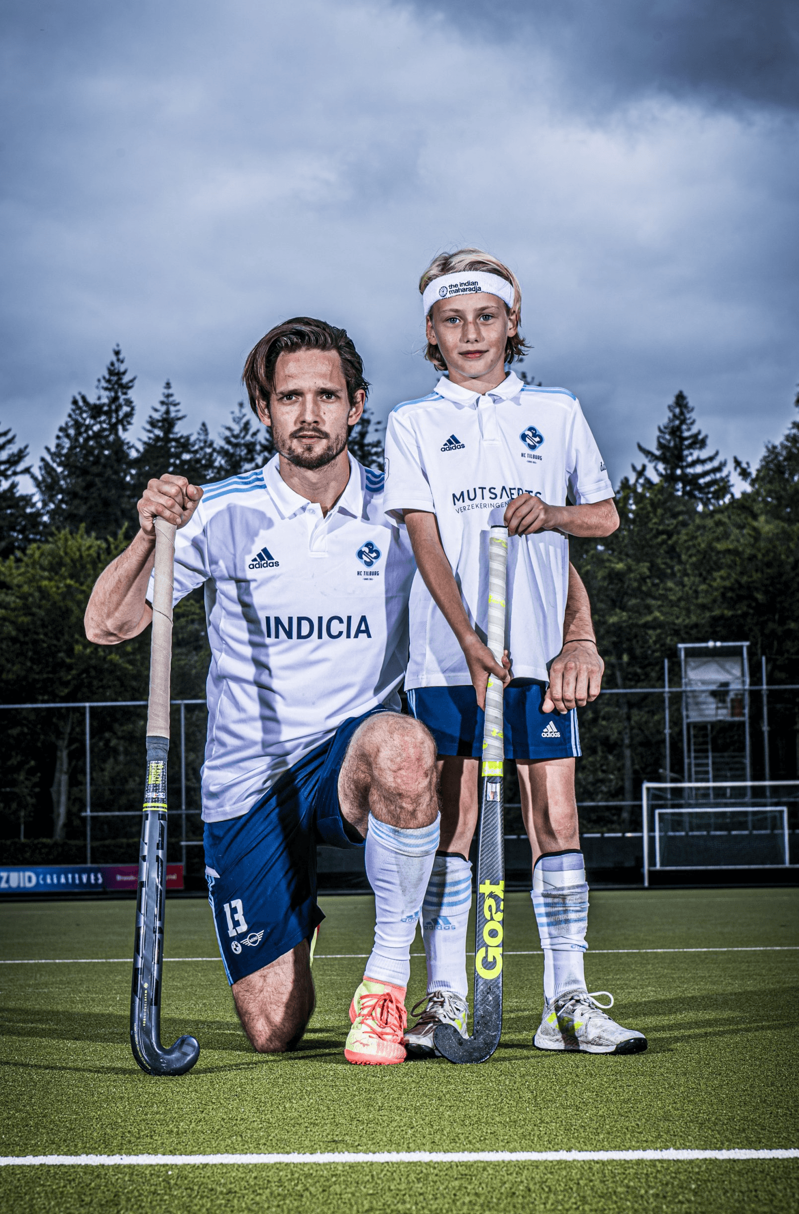 Hockeyspelers van HC Tilburg in actie tijdens een wedstrijd